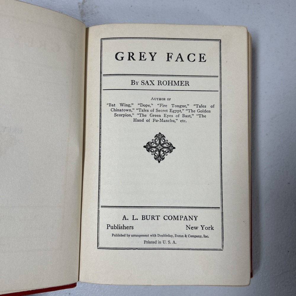 vintage 1924 mystery novel titled Grey Face by Sax Rohmer